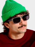 Load image into Gallery viewer, A man wearing a green hat and sunglasses made of Wenge wood, looking stylish and trendy.
